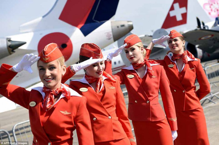 The Russia's national carrier Aeroflot is known for its eye-catching summer uniforms in its signature shade of tomato red